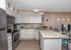 BRIGHT AND CHEERY TWO BEDROOM OCEAN FRONT CONDO STEPS AWAY FROM THE OCEAN!