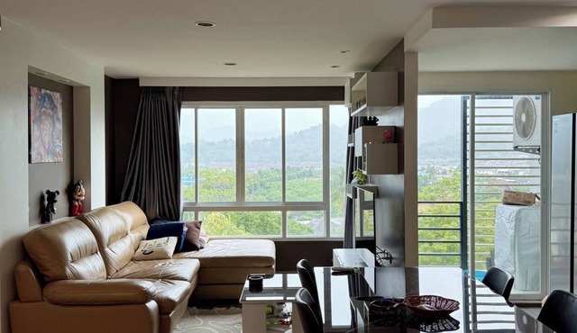 Tranquil 2-bedroom condo with AC and WiFi for a relaxing stay