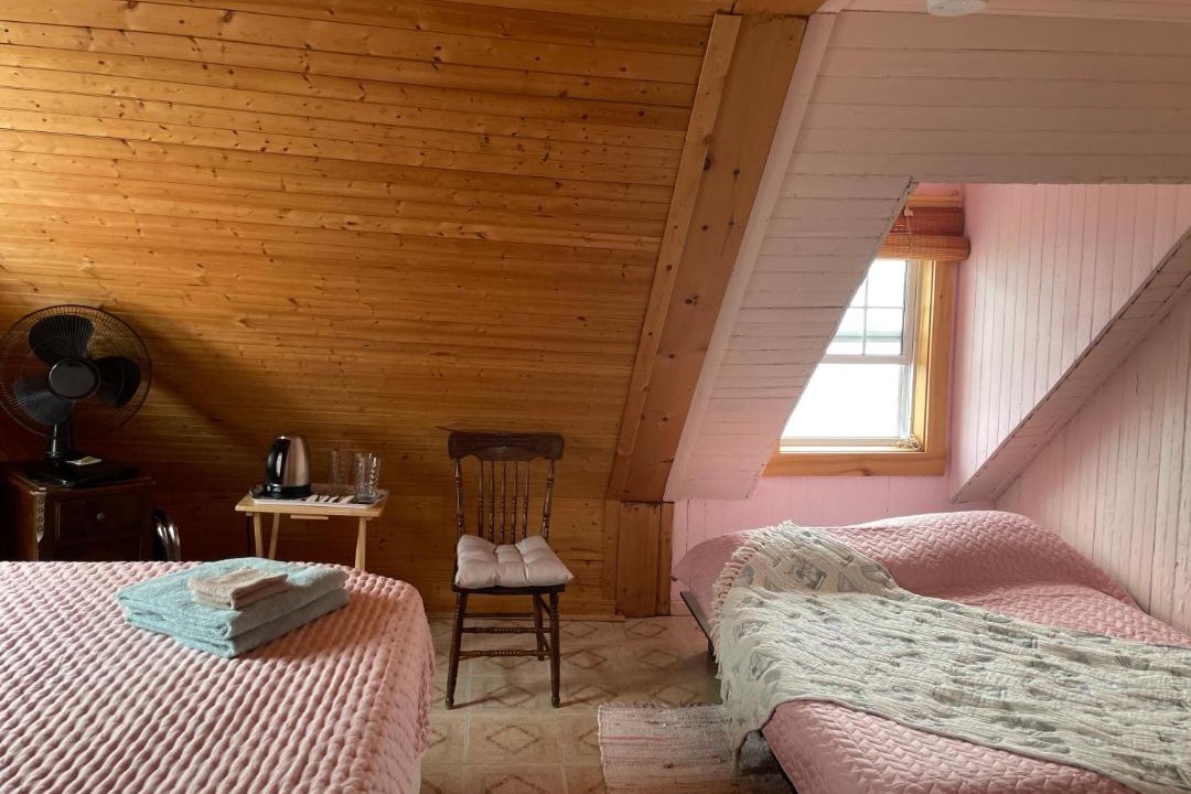 Photo of Bedroom in Cap-des-Rosiers