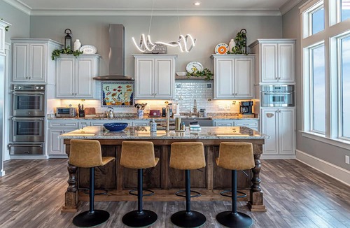 Fort Morgan House | Postcard views from your home equipped with a dream kitchen! Come enjoy luxurious living in a highly sought-after neighborhood in Fort Morgan.