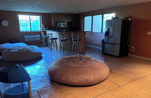 Pershing House | Family-Friendly Nebraska Estate with Scenic Pool, Gym, Theater & Fire Pit Fun